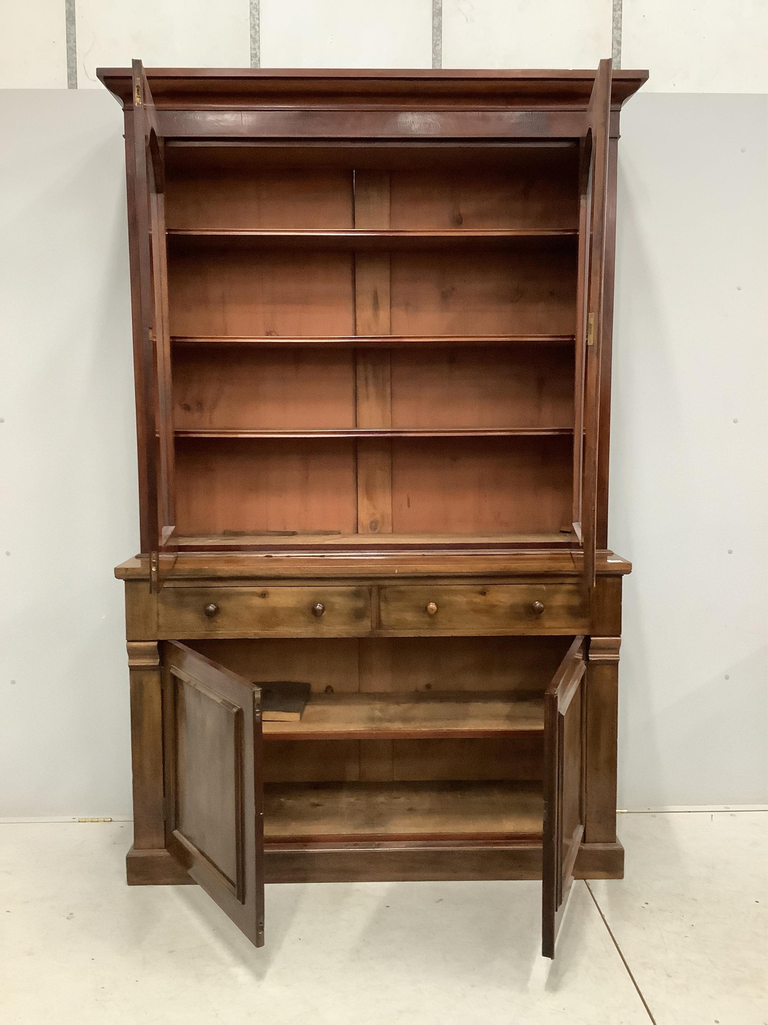 A Victorian mahogany library bookcase, width 145cm, depth 49cm, height 231cm. Condition - fair